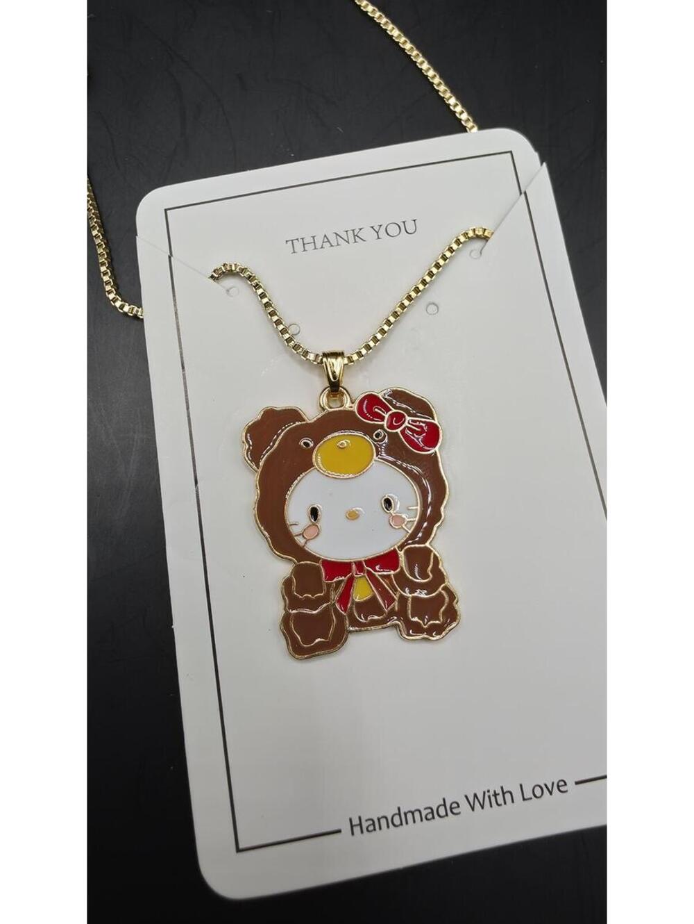 Gold-Tone Cartoon Pendant Necklace with Enamel Detail